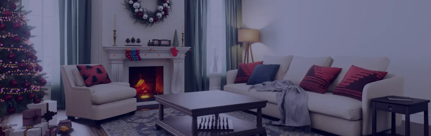 Elegant living room with sofa set, stylish cushions, fireplace, and modern home décor.