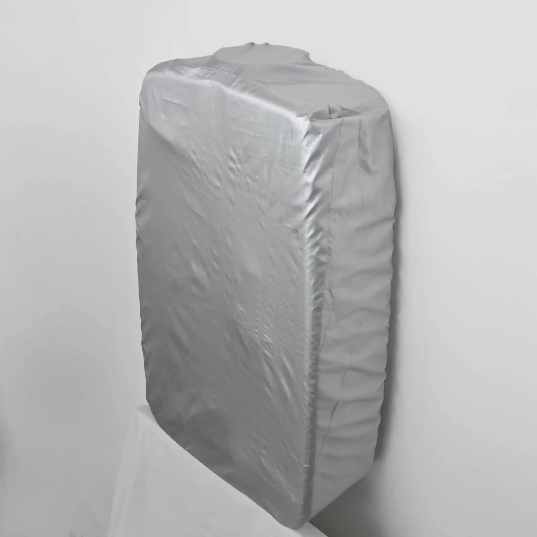 Side view of parachute geyser cover on wall